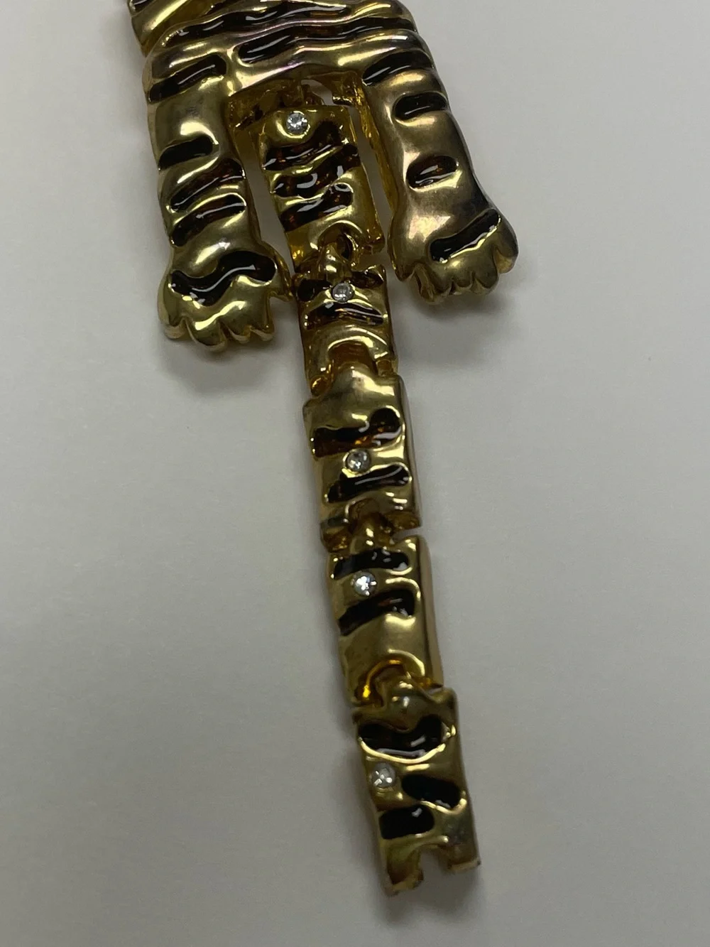 Vintage Articulated Gold-tone Prowling Panther Brooch with Green Eyes
